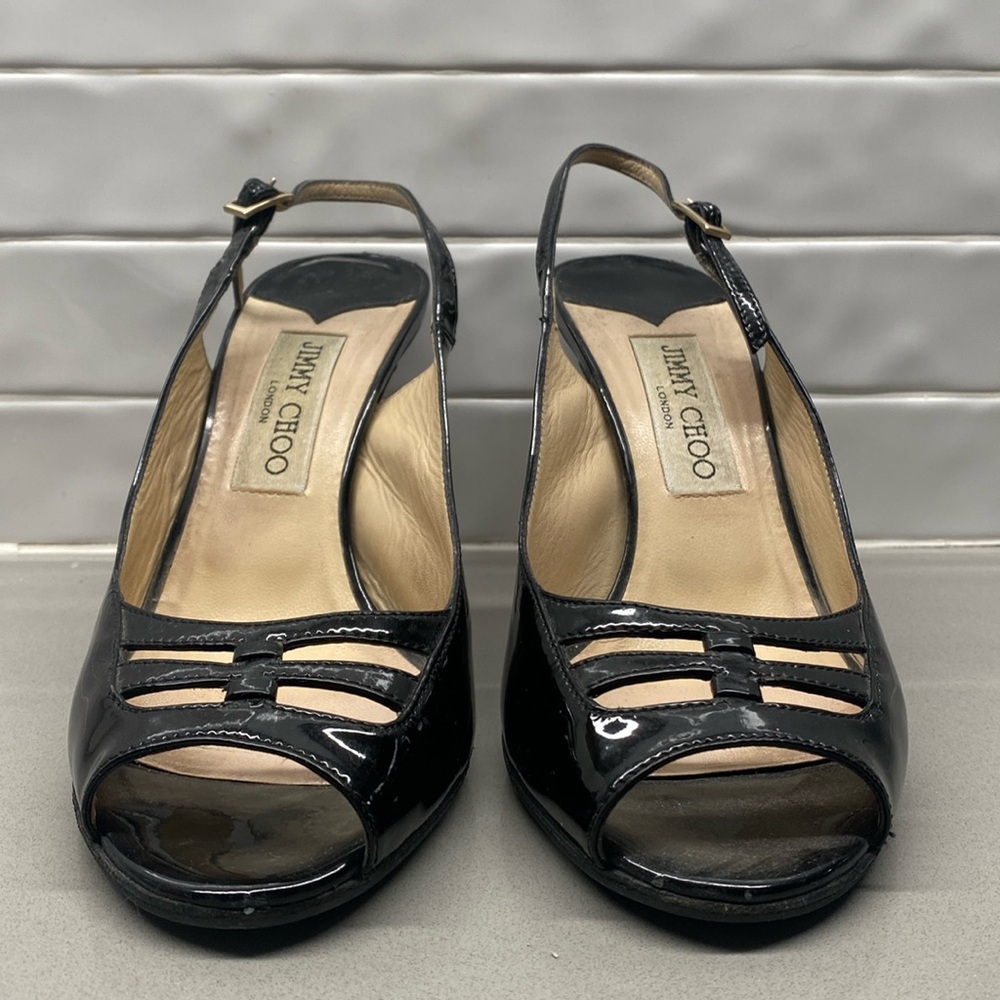Patent leather 3.5 inch sling back heels.